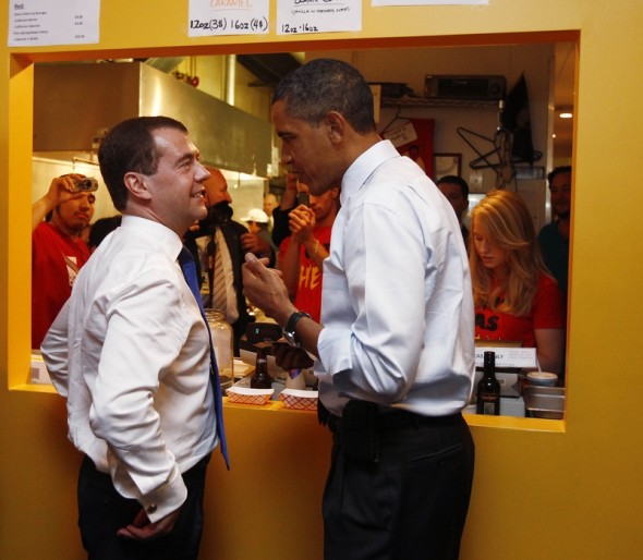 Russia's President Medvedev and U.S. President Obama discuss their lunch orders at Ray's Hell Burger in Arlington